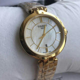 Tissot Flamingo Mother of Pearl White Dial Gold Steel Strap Watch For Women - T094.210.33.111.00 Buy Now By Tissot