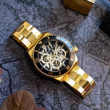 Guess Axle Multifunction Black Dial Gold Steel Strap Watch For Men - GW0488G2 Buy Now By Guess