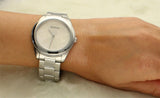 Guess Cubed Analog Silver Dial Silver Steel Strap Watch For Women - GW0606L1