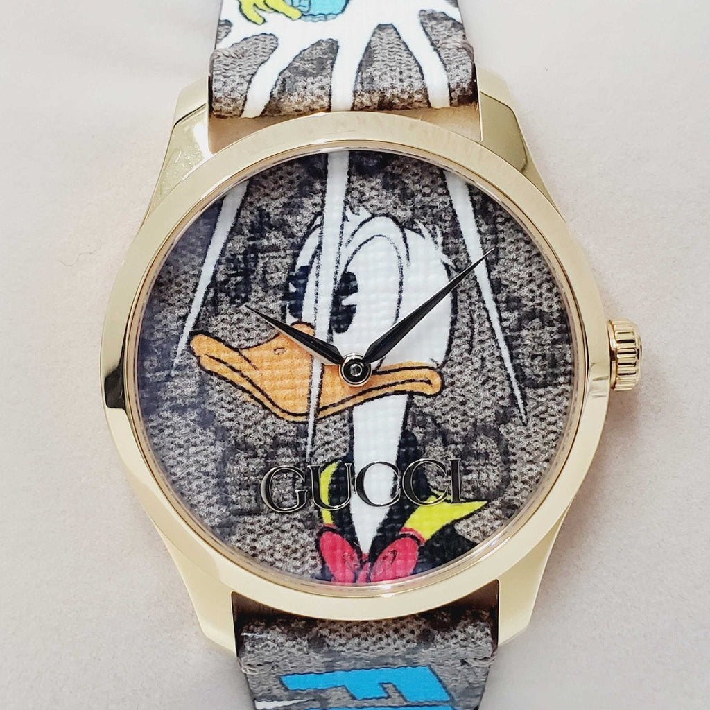 Gucci G Timeless Disney Donald Duck Brown Dial Brown Leather Strap Watch For Women - YA1264167 Buy Now By Gucci