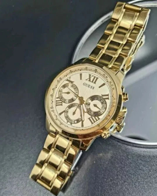 Guess Sunrise Chronograph Gold Dial Gold Steel Strap Watch For Women - W0330L1 Buy Now By Guess