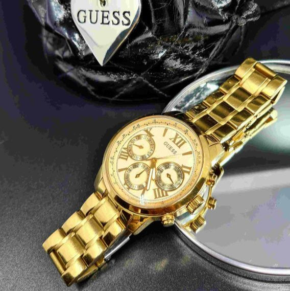 Guess Sunrise Chronograph Gold Dial Gold Steel Strap Watch For Women - W0330L1 Buy Now By Guess