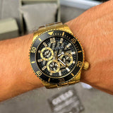 Guess Axle Multifunction Black Dial Gold Steel Strap Watch For Men - GW0488G2 Buy Now By Guess