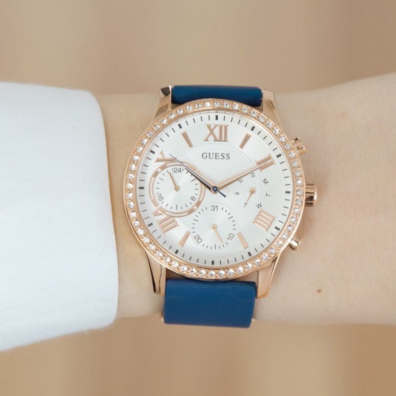 Guess Solar White Rose Gold Dial Blue Rubber Strap Watch For Women - W1135L3 Buy Now By Guess