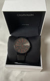 Calvin Klein Boost Black Dial Black Leather Strap Watch for Men - K7Y214CY Buy Now By Calvin Klein