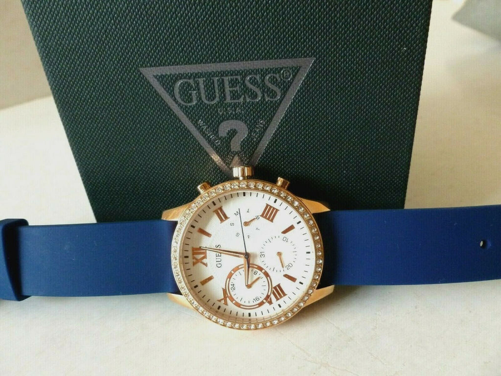Guess Solar White Rose Gold Dial Blue Rubber Strap Watch For Women - W1135L3 Buy Now By Guess