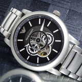Emporio Armani Meccanico Automatic Skeleton Black Dial Silver Steel Strap Watch For Men - AR60021 Buy Now By Emporio Armani