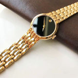 Movado Veturi Black Dial Gold Steel Strap Watch for Women - 0606935 Buy Now By Movado