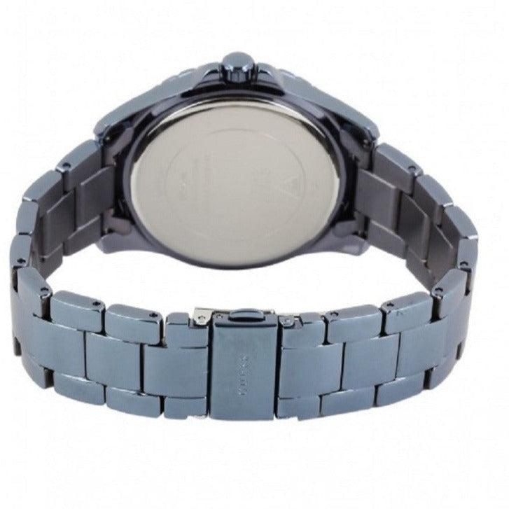 Guess Pinwheel Analog Silver Dial Blue Steel Strap Watch for Women - W0702L1 Buy Now By Guess
