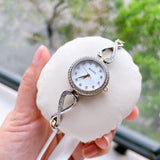 Bulova Analog Crystals Mother of Pearl Dial Silver Steel Strap Watch for Women - 98X109 Buy Now By Bulova