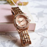 Guess Crystal Diamonds Rose Gold Dial Rose Gold Steel Strap Watch For Women - W11069L1 Buy Now By Guess