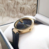 Gucci Interlocking G Gold Black Dial Black Leather Strap Unisex Watch - YA133326 Buy Now By Gucci