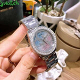 Guess G Twist Diamonds Silver Dial Silver Steel Strap Watch For Women - W1201L1 Buy Now By Guess