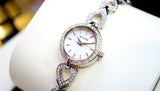 Bulova Analog Crystals Mother of Pearl Dial Silver Steel Strap Watch for Women - 98X109 Buy Now By Bulova