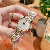 Movado Museum Classic Diamonds Mother of Pearl Dial Two Tone Steel Strap Watch For Women - 0606613 Buy Now By Movado