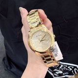 Guess Cubed Analog Gold Dial Gold Steel Strap Watch For Women - GW0606L2 Buy Now By Guess