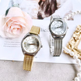 Guess Whisper Silver Dial Gold Mesh Bracelet Watch for Women - W1084L2 Buy Now By Guess