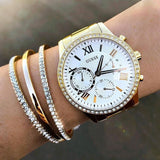 Guess Solar Chronograph Diamonds White Dial Gold Steel Strap Watch for Women - W1069L2 Buy Now By Guess