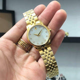 Movado Museum Classic Diamonds Mother of Pearl Dial Gold Steel Strap Watch For Women - 0606998 Buy Now By Movado