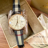 Burberry The Classic Round Gold Dial Brown Leather Strap Unisex Watch - BU10001 Buy Now By Burberry