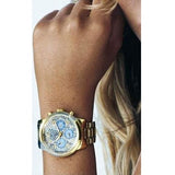 Guess Mini Sunrise Quartz Blue Dial Gold Steel Strap Watch For Women - W0448L6 Buy Now By Guess