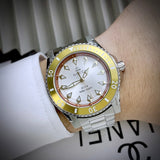 Gucci Dive Automatic 18K Gold Silver Dial Silver Steel Strap Watch for Men - YA136357 Buy Now By Gucci