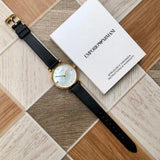 Emporio Armani Gianni T-Bar Quartz Mother of Pearl Dial Black Leather Strap Watch For Women - AR1910 Buy Now By Emporio Armani