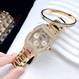 Guess Phoenix Multifunction Crystals Gold Dial Gold Steel Strap Watch For Men - GW0094G2 Buy Now By Guess