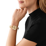 Michael Kors Chain Lock Analog Crystals Silver Dial Gold Steel Strap Watch for Women - MK4809 Buy Now By Michael Kors