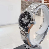 Gucci G Timeless Quartz Diamonds Black Dial Silver Steel Strap Watch For Women - YA1265024 Buy Now By Gucci
