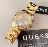 Guess Confetti Diamonds Silver Dial Gold Steel Strap Watch for Women - W0774L5 Buy Now By Guess