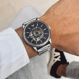 Emporio Armani Meccanico Automatic Skeleton Black Dial Silver Steel Strap Watch For Men - AR60021 Buy Now By Emporio Armani