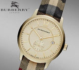 Burberry The Classic Round Gold Dial Brown Leather Strap Unisex Watch - BU10001 Buy Now By Burberry