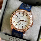 Guess Swirl Analog Quartz White Dial Blue Rubber Strap Watch for Women - W1096L4 Buy Now By Guess