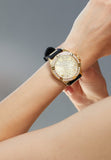 Guess Frontier Diamonds Gold Dial Black Rubber Strap Watch For Women - W1160L1 Buy Now By Guess
