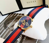 Gucci G Timeless Bee Red & Blue Dial Red Two Tone Nylon Strap Watch For Men - YA1264061 Buy Now By Gucci