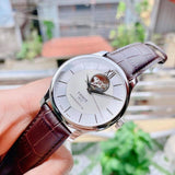 Tissot T Classic Tradition Powermatic 80 Open Heart Silver Dial Brown Leather Strap Watch for Men - T063.907.16.038.00 Buy Now By Tissot