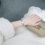 Bulova Analog Crystals Mother of Pearl Dial Silver Steel Strap Watch for Women - 98X109 Buy Now By Bulova