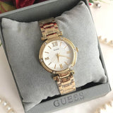 Guess Park Ave South Analog White Dial Gold Steel Strap Watch For Women - W0767L2 Buy Now By Guess