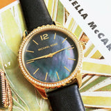 Michael Kors Layton Three Hand Mother of Pearl Black Dial Black Leather Strap Watch For Women - MK2911 Buy Now By Michael Kors