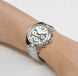 Guess Sunrise Multifunction Quartz White Dial Silver Steel Strap Watch For Women - W0330L3 Buy Now By Guess