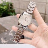 Guess Cubed Analog Silver Dial Silver Steel Strap Watch For Women - GW0606L1 Buy Now By Guess