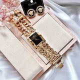 Guess Trend Multi Chain Black Dial Gold Steel Strap Watch for Women - U1117L5 Buy Now By Guess