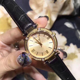 Guess Park Avenue Quartz Gold Dial Black Leather Strap Watch For Women - W0838L1 Buy Now By Guess