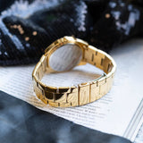 Guess Cubed Analog Gold Dial Gold Steel Strap Watch For Women - GW0606L2