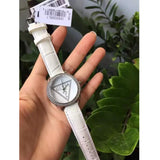 Guess Mini Triangle Quartz Diamonds Silver Dial White Leather Strap Watch For Women - W65006L1 Buy Now By Guess