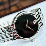 Movado Classic Quartz Black Dial Silver Steel Strap Watch for Men - 0606337 Buy Now By Movado